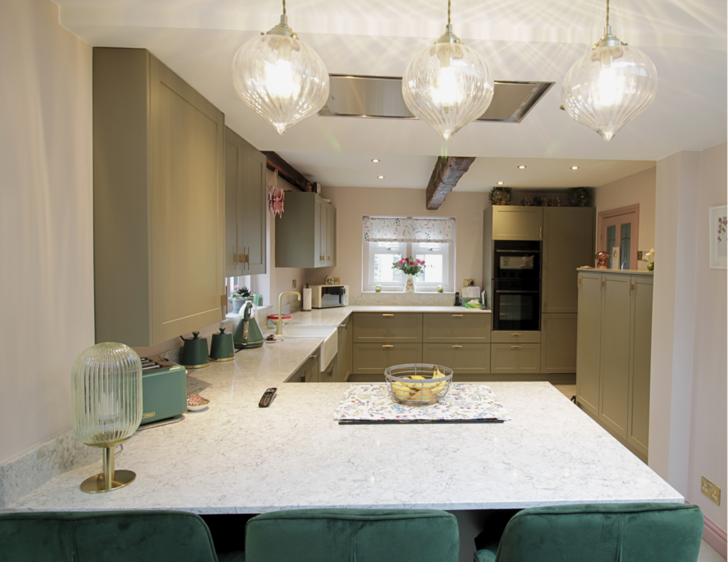 View of a sage green kitchen renovation in Stalybridge, Cheshire.