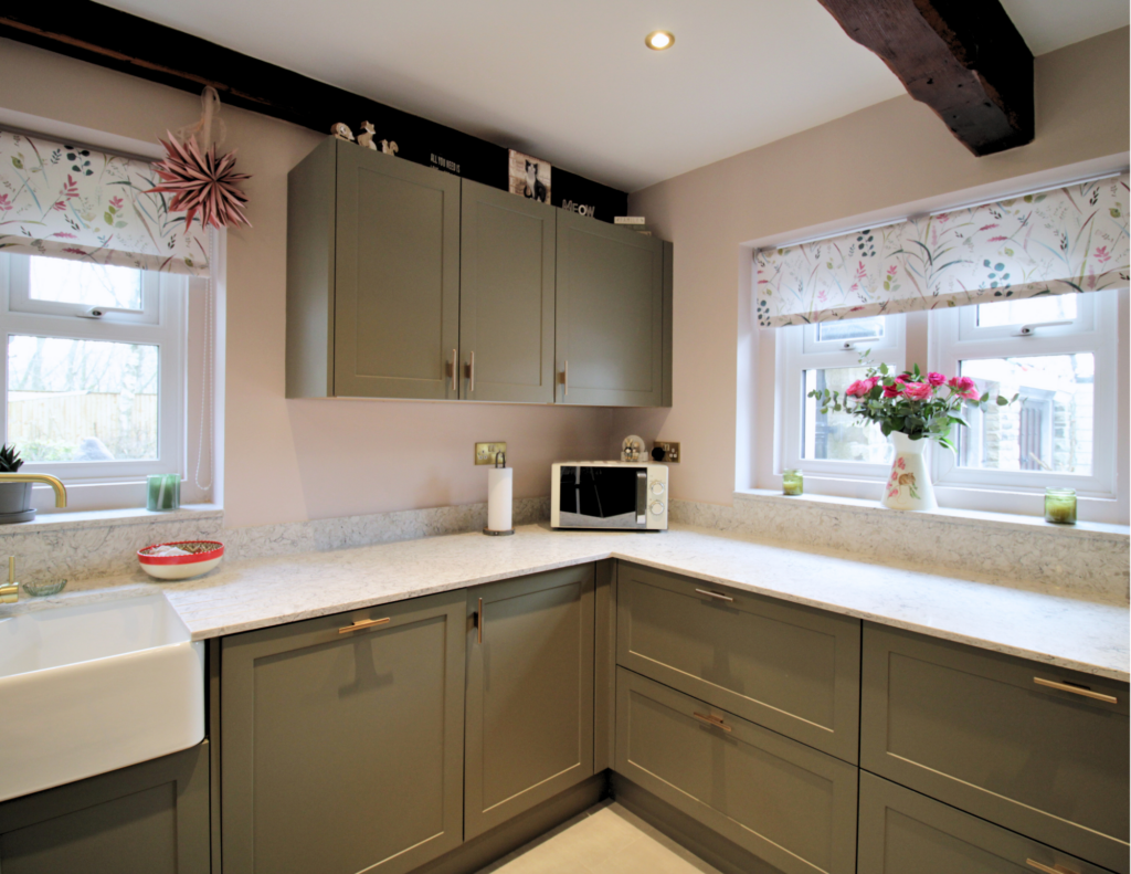 Sage green cabinets installed as part of a kitchen renovation in Stalybridge, Cheshire.