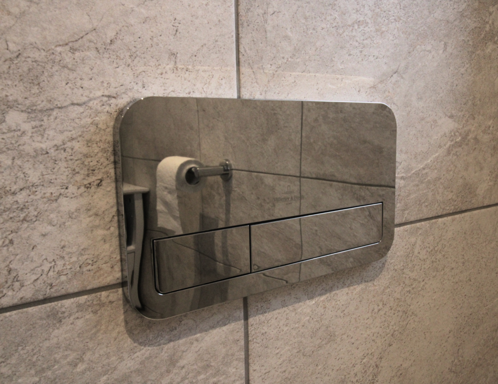 High quality bathroom fittings - a Villeroy and Boch flush plate