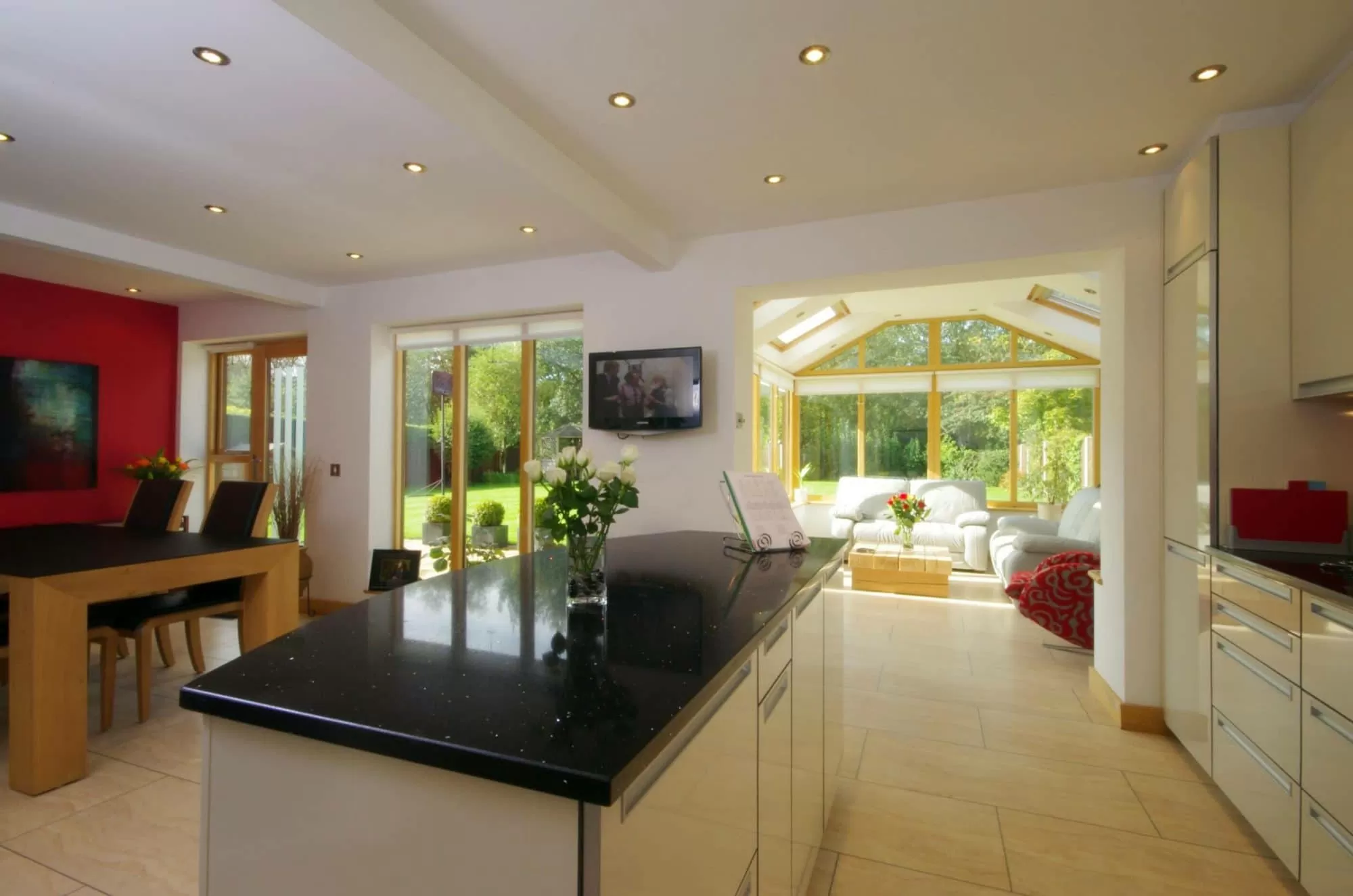modern white kitchen with granite worktops